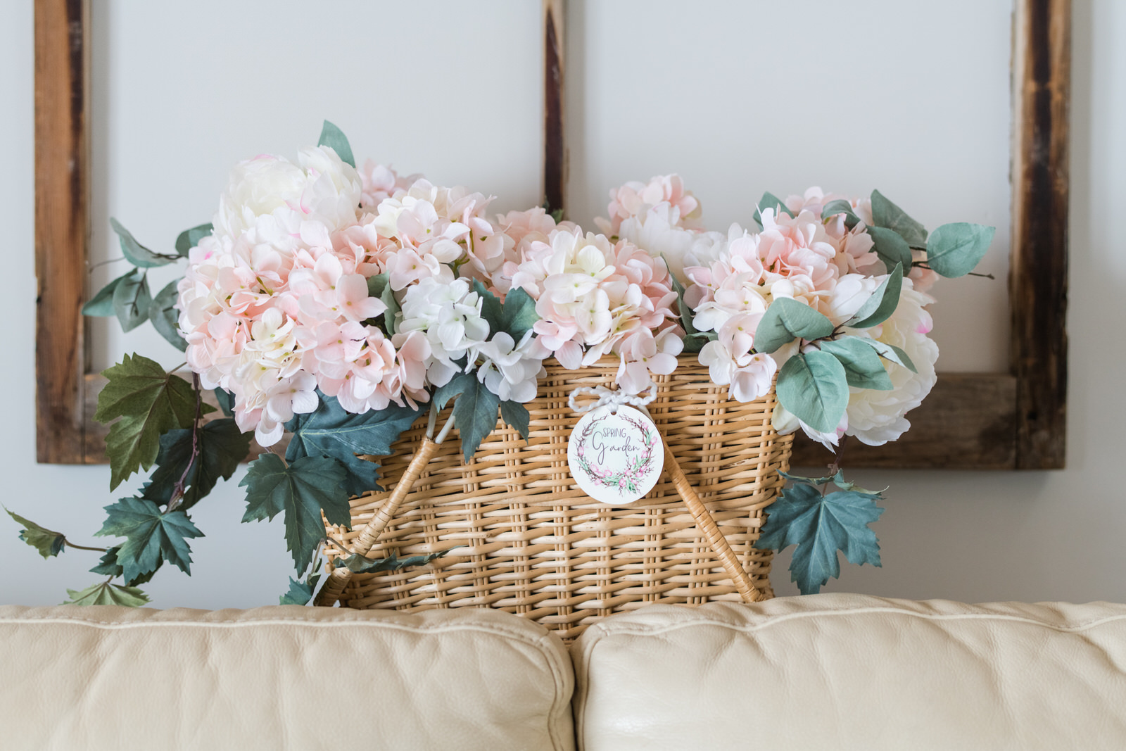 farmhouse chic decor tag on a basket of flowers
