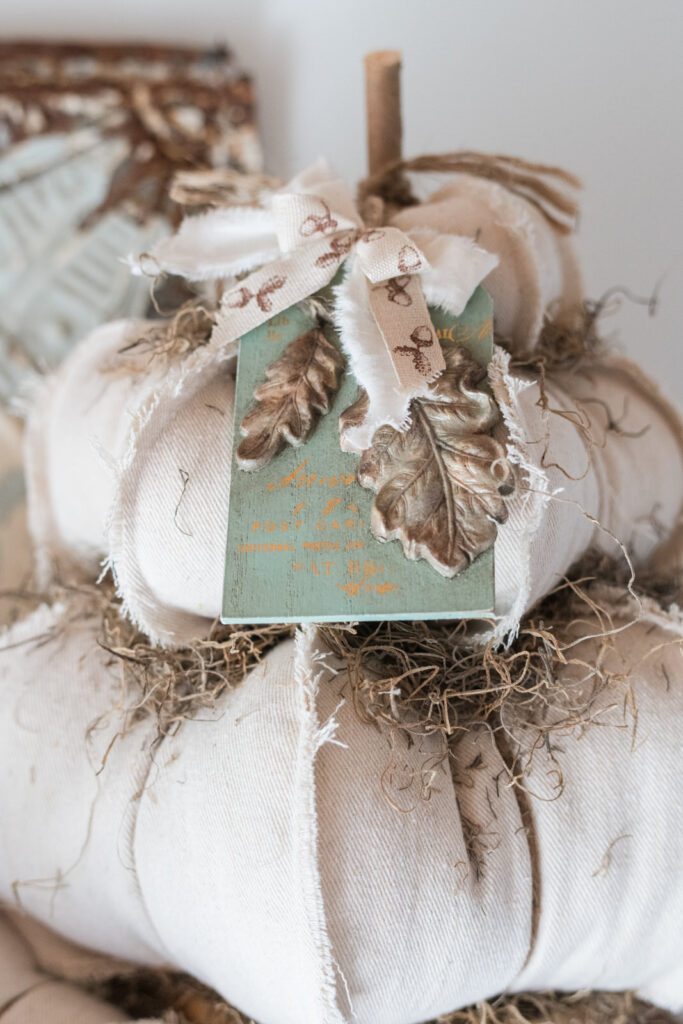 Acorn leaf mould from IOD styled on a smaller DIY drop cloth topiary pumpkin in my kitchen