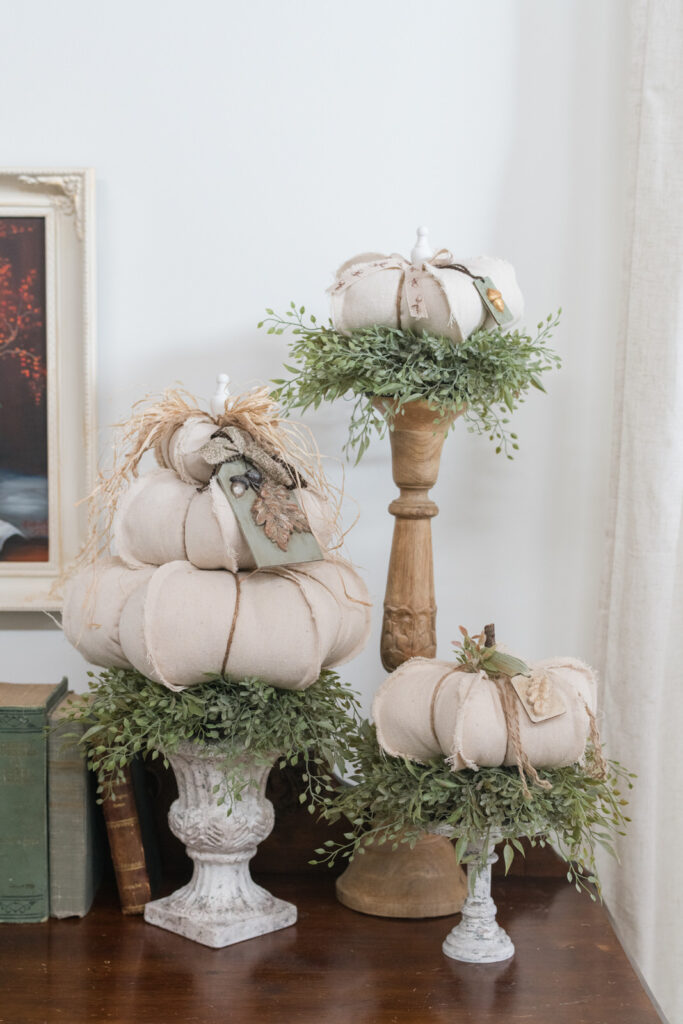 Acorn and leave the tags on DIY dropcloth pumpkin collection in living room 
