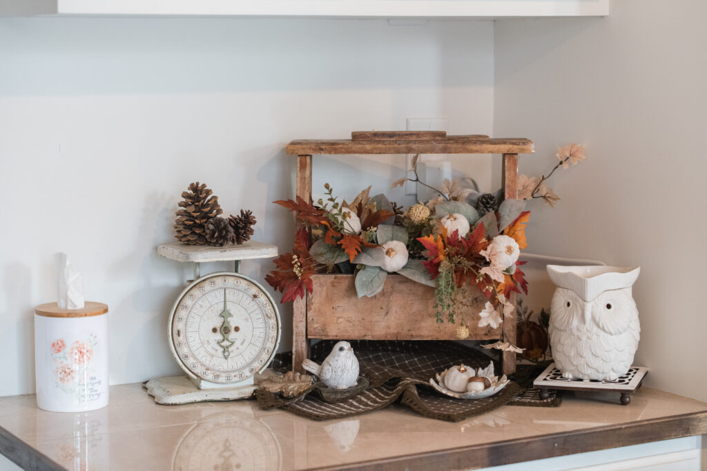 Old shoeshining box, repurposed for fall decor in a vignette in my kitchen