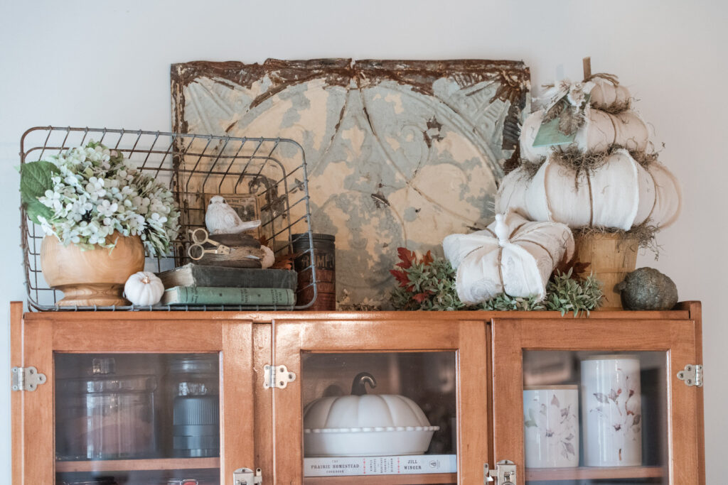 hoosier cabinet decorated for fall