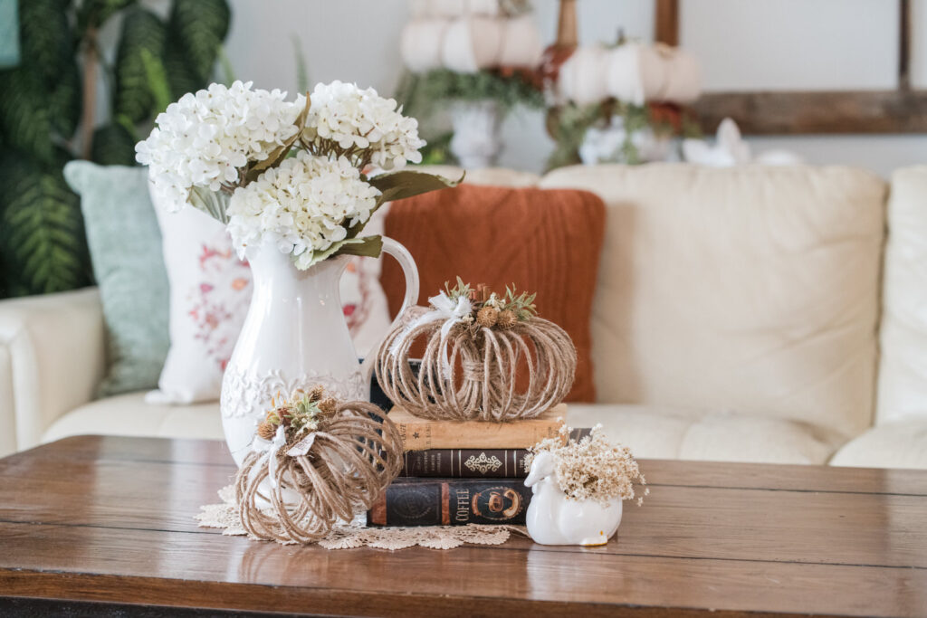DIY twine pumpkins on a coffee table fall display 