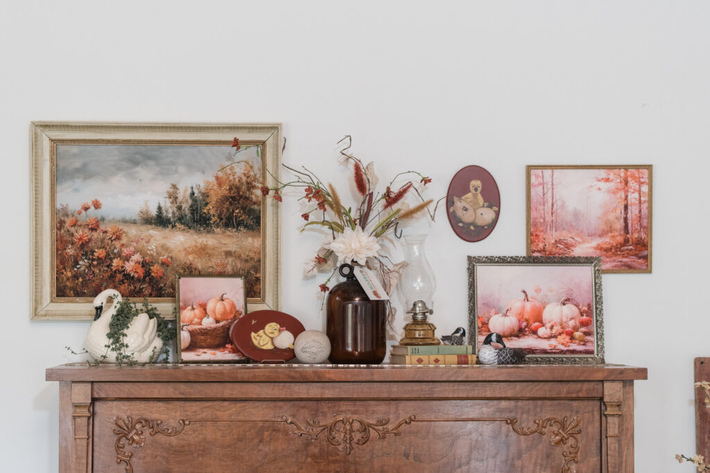 Beautiful autumn gallery wall above a vintage, upright piano, styled with Thrifted and hand-painted, treasures 