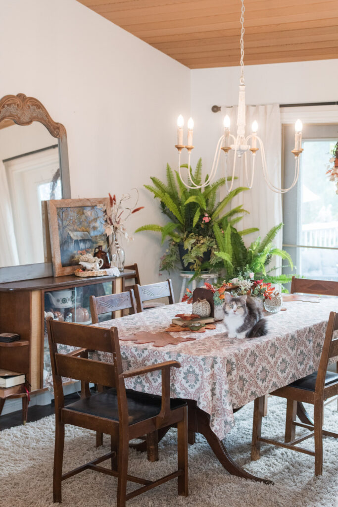 Dining room filled with nostalgia and vintage decor for fall