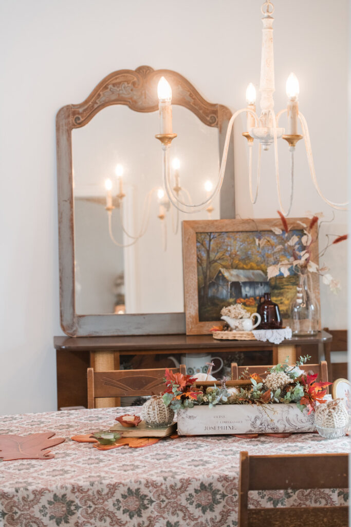 Fall living room, Thrifted mirror, reflecting a beautiful charming cottage chandelier 