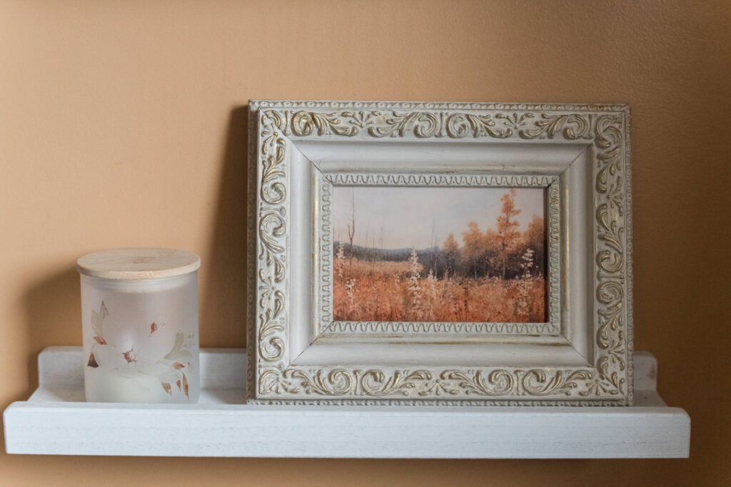 Printed art in a repurposed frame for bathroom, decor in the fall