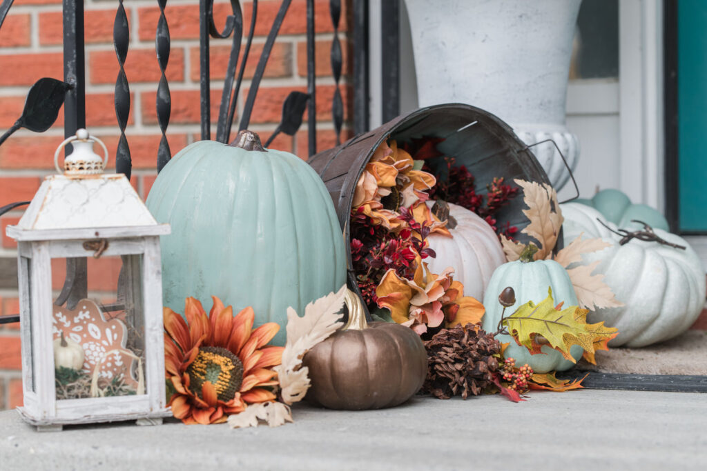 Falstaff adorned with hand, painted pumpkins, and fall florals 