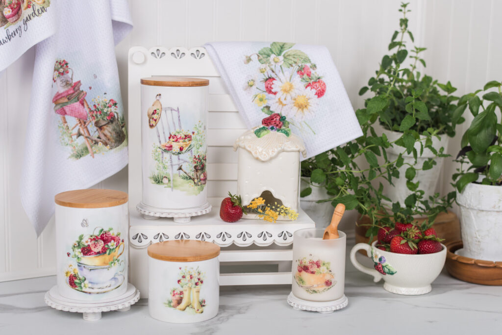 Strawberry canisters set up in a charming display for a coffee or tea bar.