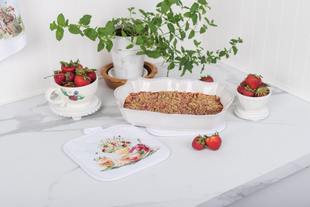 Cottage strawberry potholder styled in a charming kitchen scene