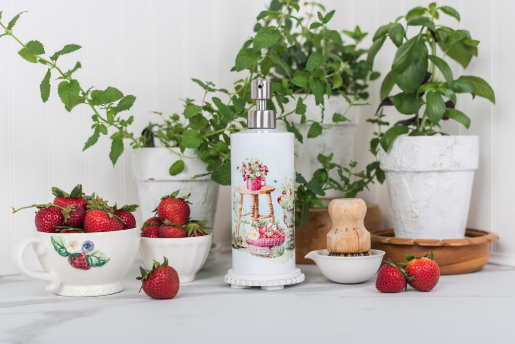 Strawberry soap dispenser in a summer kitchen.