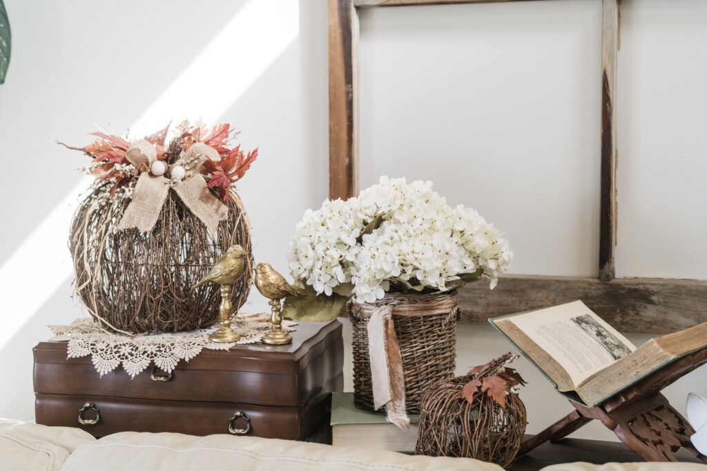 sofa table styled for fall with thrifted, new and vintage items