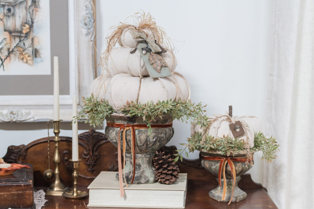 DIY Dropcloth pumpkins in cement urns