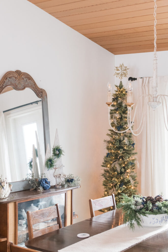 Blue and gold Christmas dining room decor with vintage cottage style