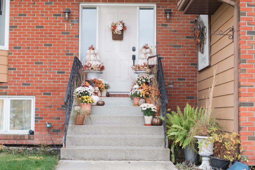 fall front steps decorated for the season