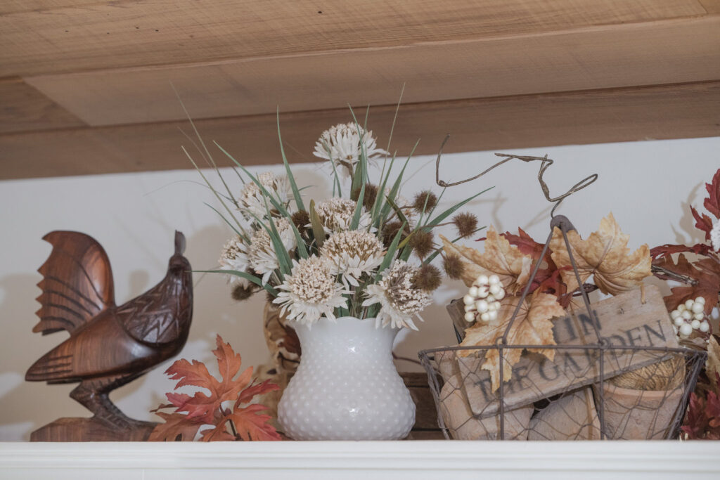 Thrifted milk, glass lamp shade flipped upside down, turned into a vase for fall decor 