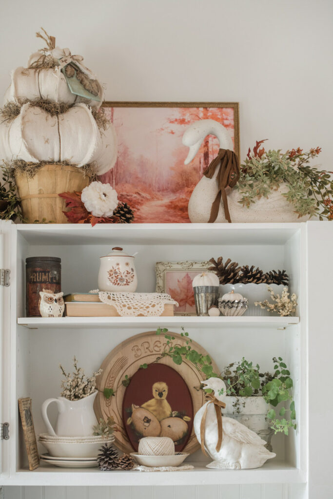 Open shelving in kitchen decorated for fall