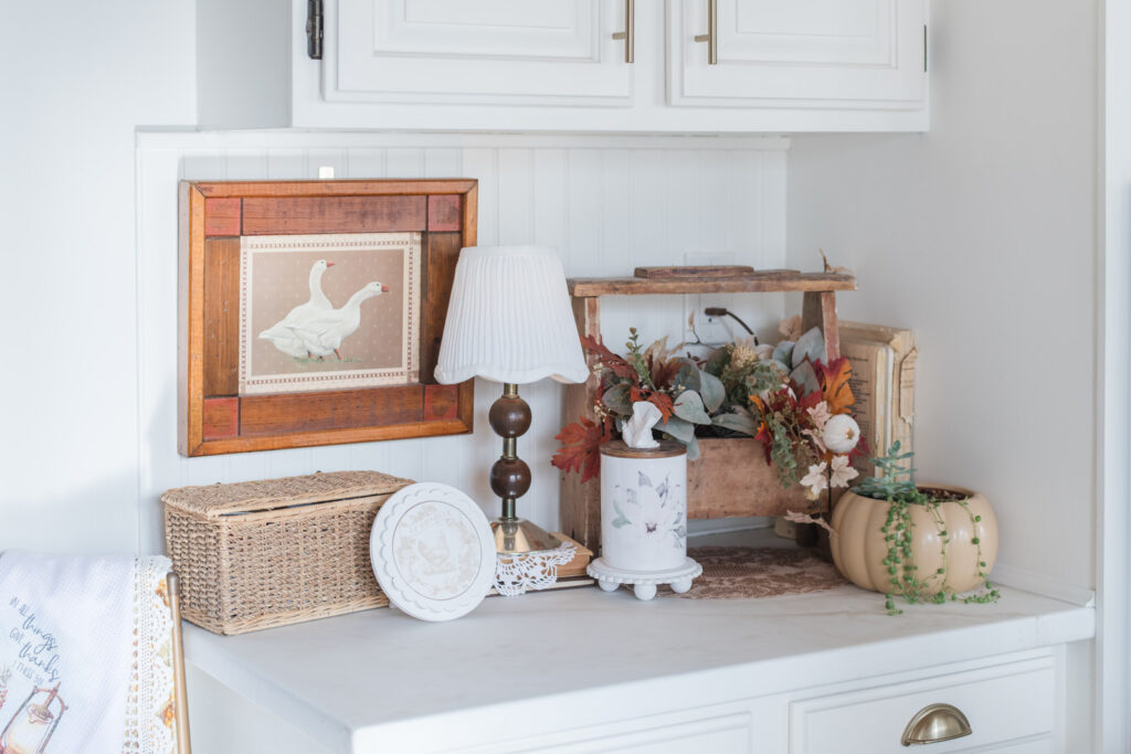  vintage and you items on the kitchen desk area decorated for fall