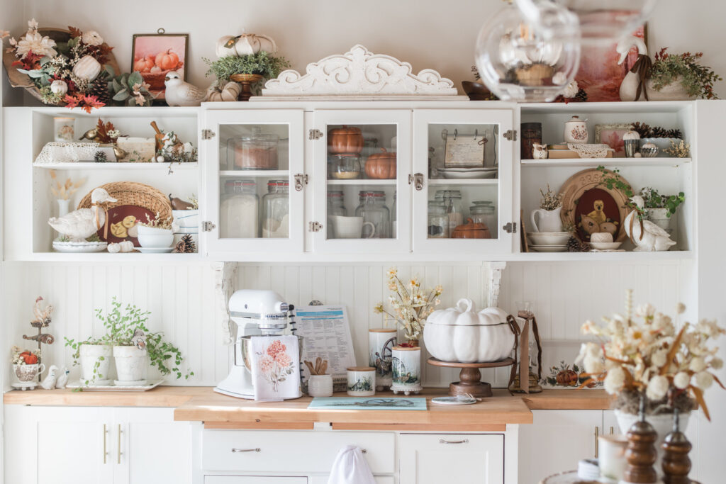 Vintage, hoosier cabinet built in to make a kitchen pantry/baking nook decorated for fall