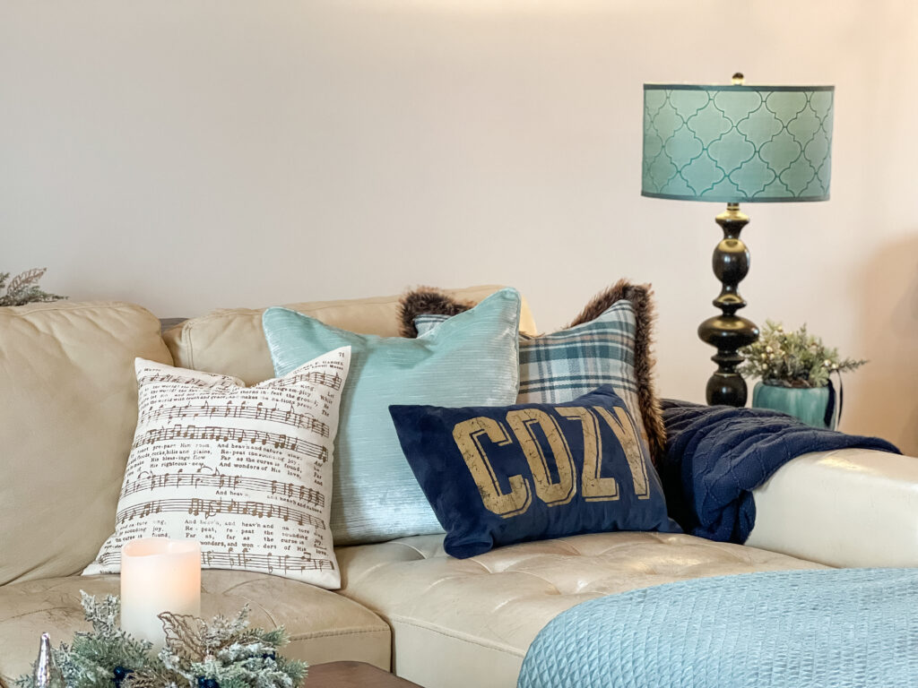 DIY Christmas pillow covers made with Chalk Couture silk-screen stencils in navy velvet and music note fabric.