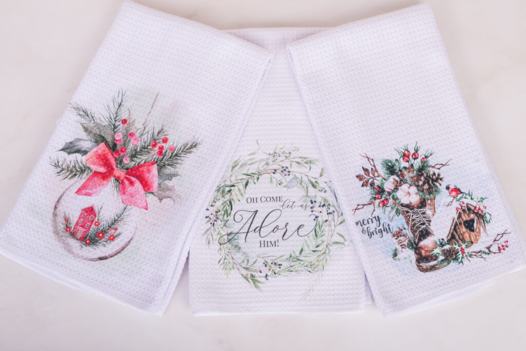 three Christmas Tea towels ready to gift