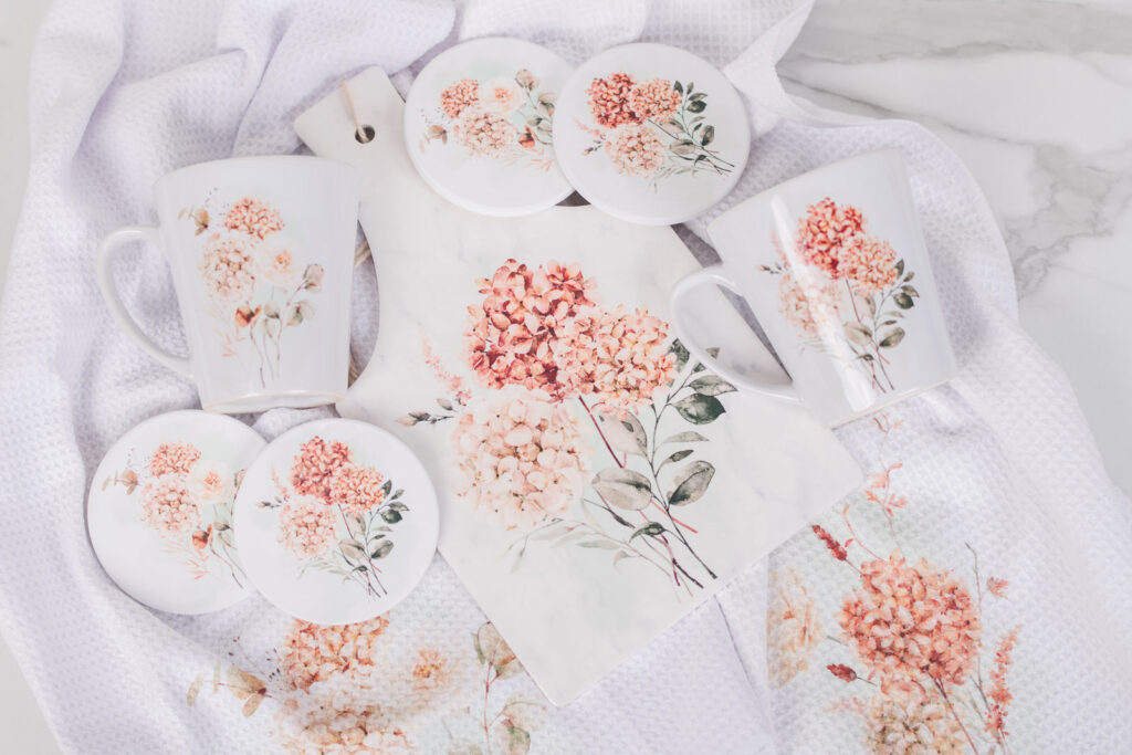 Spicy floral gift set with coasters latte, mugs, and a kitchen trivet or hot pad and two tea towels for gifting