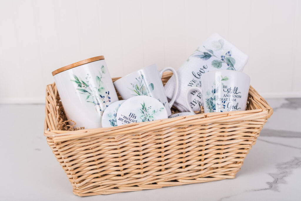 Coffee lovers gift set with two coffee, mugs, coasters, a tea towel and a coffee cannister