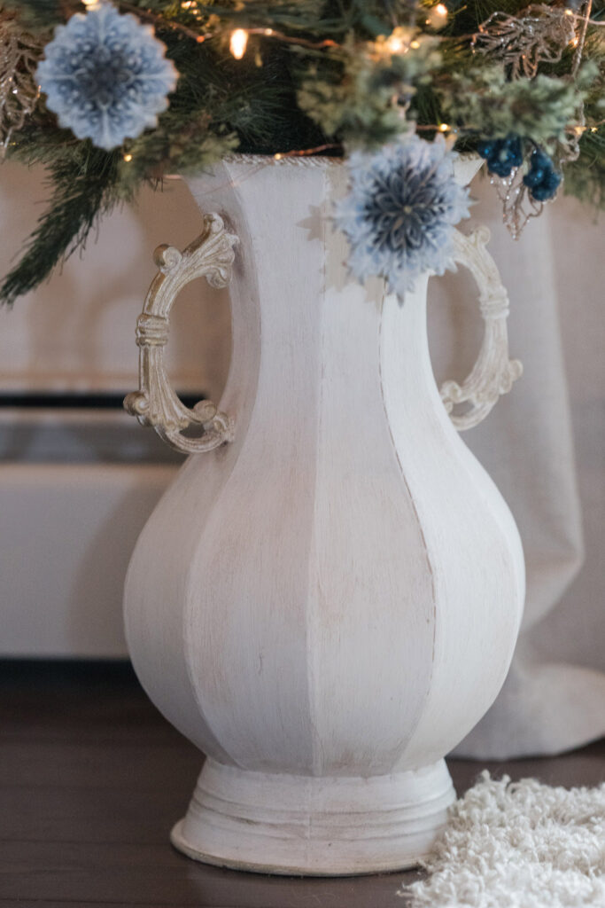 An urn transformed into a Christmas tree stand 