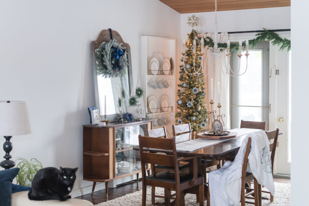 Dining room decorated for Christmas with vintage inspired crafts 
