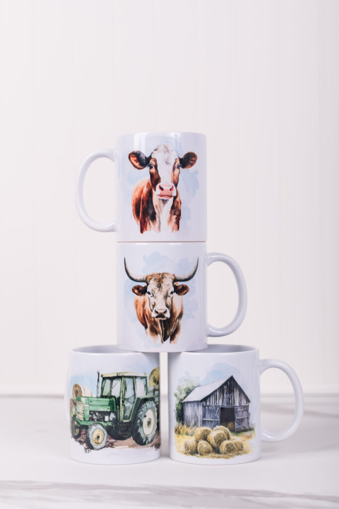 Farmhouse mugs from the Homestead Collection with barnyard and country designs