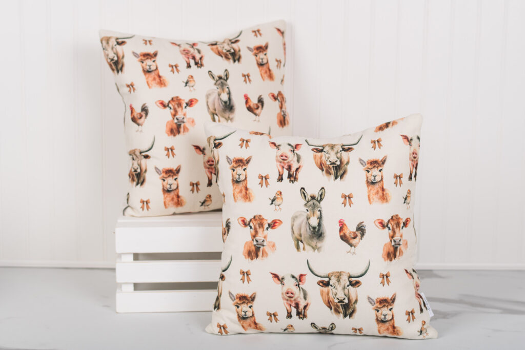 Farmhouse pillow from the Homestead Collection featuring farm animals