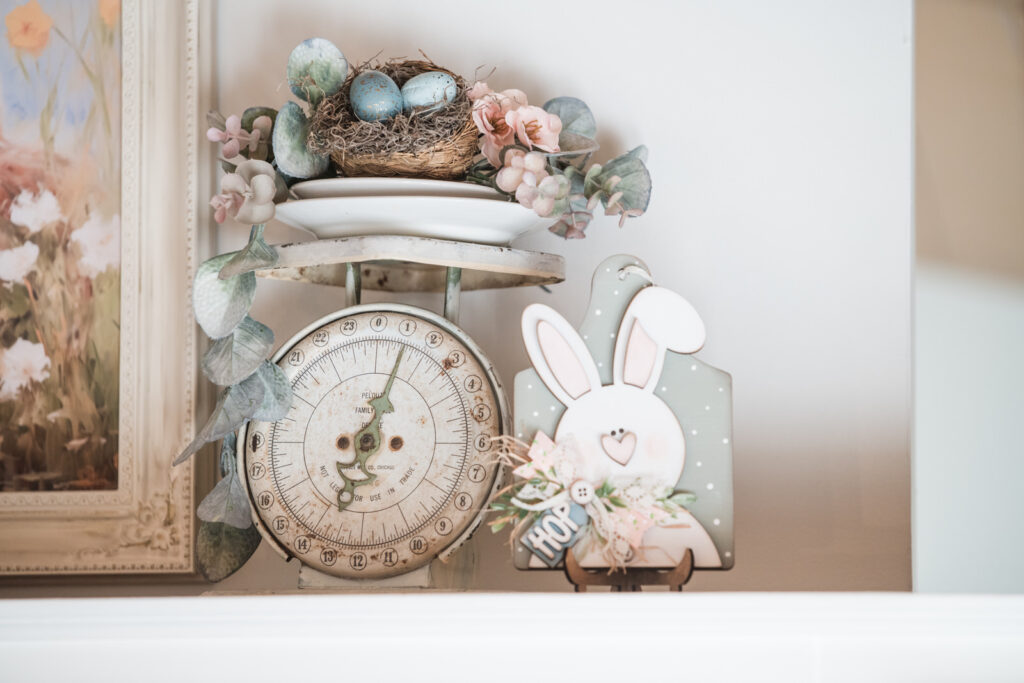 bunny craft kit finished and styled beside a vintage scale in kitchen