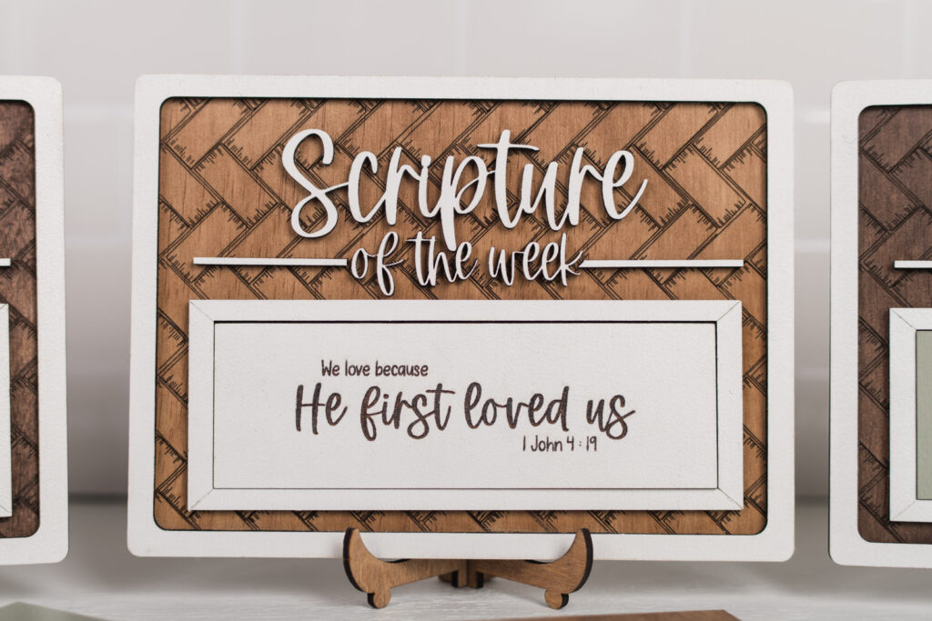 Scripture of the week sign in colonial and white