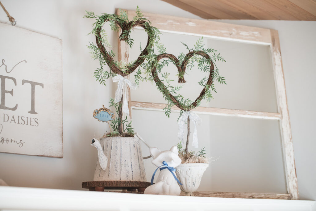 Grapevine heart topiary DIY project styled above the kitchen cupboards